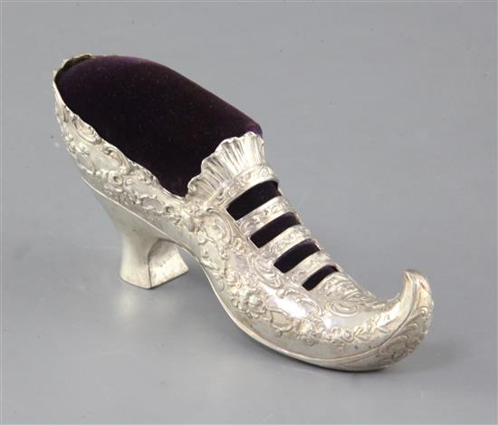 A late 19th/early 20th century German Hanau silver novelty slipper pin cushion, 16cm.